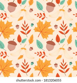 Seamless autumn pattern with leaves and acorns. Vector. Colorful cartoon background in flat style.