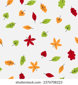 Seamless autumn pattern with leaves. Fall leaf elements in red, yellow, green colors on white backround.  Illustration for textile, fabric, print design, wallpaper, gift paper. Vector