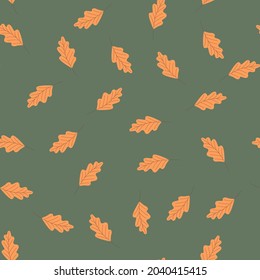 Seamless autumn pattern. Leaves on a green background. Flat vector illustration