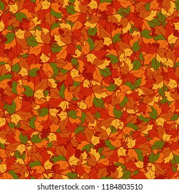 Seamless autumn pattern from maple leaves.