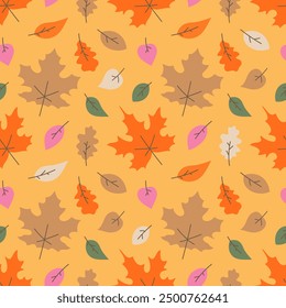 Seamless autumn pattern with maple and oak leaves, autumn background with falling leaves.