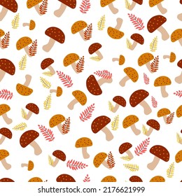 seamless autumn pattern with mushrooms and sprigs of leaves in an autumn palette