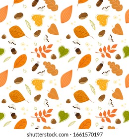 Seamless autumn pattern with nuts and leaves. Vector pattern.