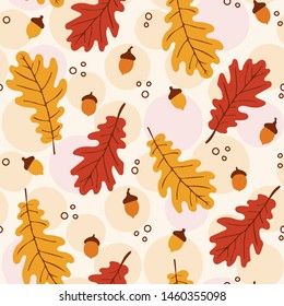 Seamless autumn pattern with oak leaves and acorns