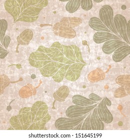 Seamless autumn pattern with oak leaves and acorns. Vector illustration.
