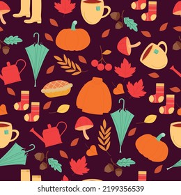 Seamless autumn pattern on a dark background. Vector illustration.