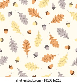 Seamless autumn pattern with orange, yellow and grayish oak leaves and acorns on light background. Vector illustration.