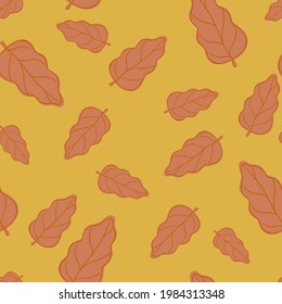 Seamless autumn pattern with random orange oak leaves print. Orange-ocher background. Nature print. Vector illustration for seasonal textile prints, fabric, banners, backdrops and wallpapers.