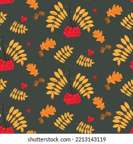 Seamless autumn pattern with rowan and oak leaves and rowan berries and acorns