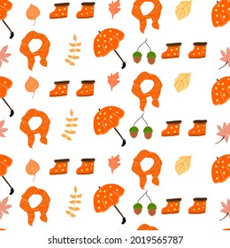 Seamless autumn pattern with umbrellas and scarves and boots.