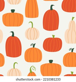 Seamless autumn pattern with various pumpkins. Vector cute halloween background.