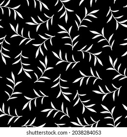 Seamless autumn pattern with white painted leaves on a black background in vector