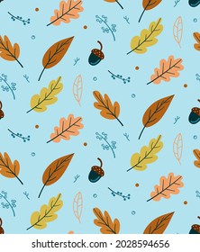 Seamless autumn pattern. Yellow leaves, branches with berries and an acorn. Color vector illustration for fabric, paper.