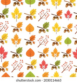 Seamless autumn texture with leaves, mountain ash, acorns. For background, wallpaper, fabric, textiles, wrapping paper.