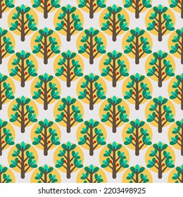 Seamless autumnal vector cartoon pattern with green pine trees on yellow circles and gray background. For kids textile or wrapping and holiday gift paper.