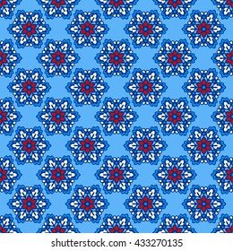 Seamless background with abstract flowers.