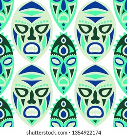 Seamless Background. Abstract Seamless Pattern with Color Masks for Print or Card. Ethnic Seamless Background with Color Trible Ritual Masks for your Design. Vector Texture.