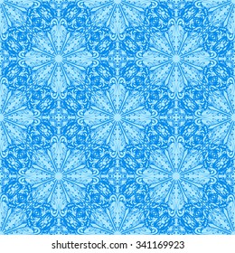 Seamless background. Abstract pattern with lacy snowflakes. Vector illustration.
