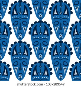 Seamless Background. Abstract Seamless Background with Ritual Masks for Card or Poster. Ethnic Seamless Background with Color Trible Ritual Masks for your Design. Vector Texture.