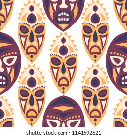 Seamless Background. African Seamless Background with Ritual Masks for Textile or Paper. Ethnic Seamless Background with Color Trible Ritual Masks for your Design. Vector Texture.