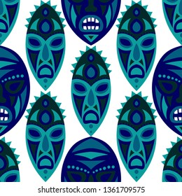 Seamless Background. African Seamless Background with Ritual Masks for Textile or Paper. Ethnic Seamless Pattern with Color Trible Shamanic Masks for your Design. Vector Texture.