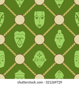 Seamless background with African ritual masks for your design