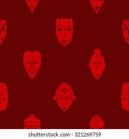 Seamless background with African ritual masks for your design