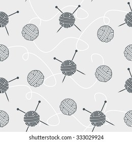 seamless background balls of yarn and knitting needles