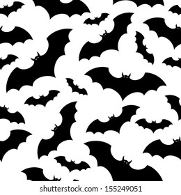 Seamless background with bats. Vector illustration.