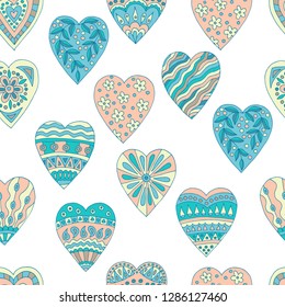 Seamless background of beautiful painted doodle hearts on white background