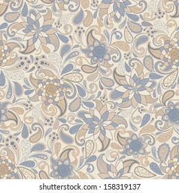 Seamless background of beige and blue of flowers