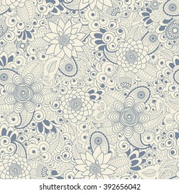 Seamless background of beige and blue of flowers