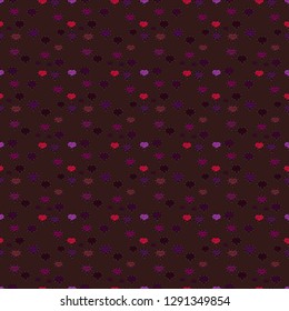 Seamless background of big and small hearts with swirls in purple, brown and black colors. Vector illustration.
