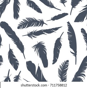Seamless background with bird feathers.