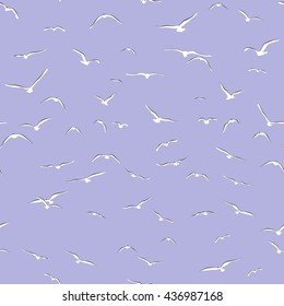 seamless background with birds in the blue sky