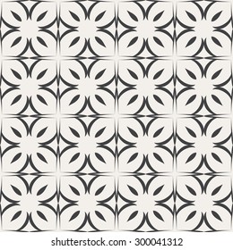 Seamless background with black geometric swirls on a light background.