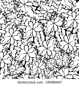 seamless background of black and white abstract flowers. Vector 