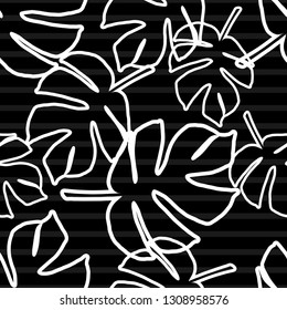 Seamless background with black and white decorative Tropical palm leaves. Monstera. Vector illustration. Can be used for wallpaper, textile, invitation card, wrapping, web page background.