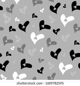 Seamless background of black, white hearts on a dark background, perfect for celebrations, wedding invitations, mothers day and valentines day