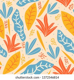 Seamless background with blue, orange and yellow leaves. Vector design.