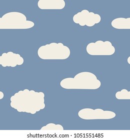 Seamless background with blue sky and white cartoon clouds. Vector illustration.