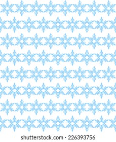 Seamless background of blue snowflakes
