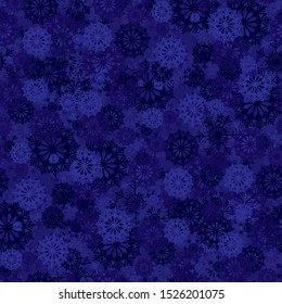 Seamless background with blue snowflakes for Christmas decorations