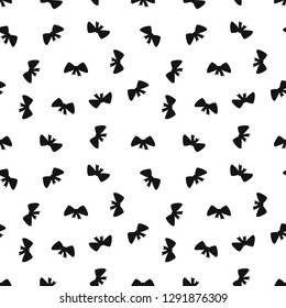 Seamless background with bows. Vector illustration. Monochrome pattern