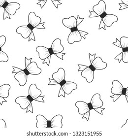 Seamless background with bows. Vector illustration. Monochrome pattern