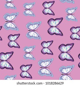Seamless background from bright butterflies. Beautiful colorful butterflies chaotically fly. Seamless multicolored background with flying moths. Suitable for fabric, paper, packaging.
