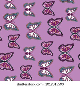 Seamless background from bright butterflies. Beautiful colorful butterflies chaotically fly. Seamless multicolored background with flying moths. Suitable for fabric, paper, packaging.