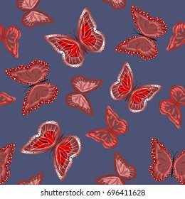 Seamless background from bright butterflies. Beautiful colorful butterflies chaotically fly. Seamless multicolored background with flying moths. Suitable for fabric, paper, packaging.