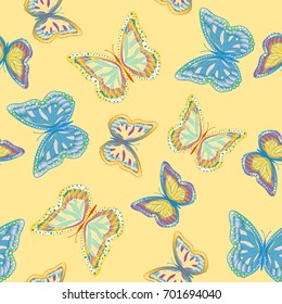 Seamless background from bright butterflies. Beautiful colorful butterflies chaotically fly. Seamless multicolored background with flying moths. Suitable for fabric, paper, packaging.