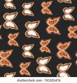 Seamless background from bright butterflies. Beautiful colorful butterflies chaotically fly. Seamless multicolored background with flying moths. Suitable for fabric, paper, packaging.